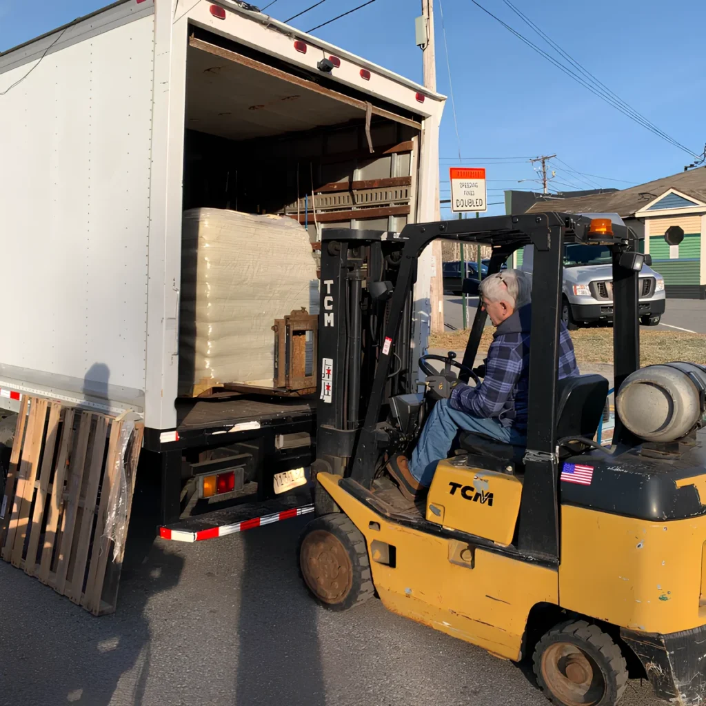 Image showing a tractor used to deliver items from a truck.